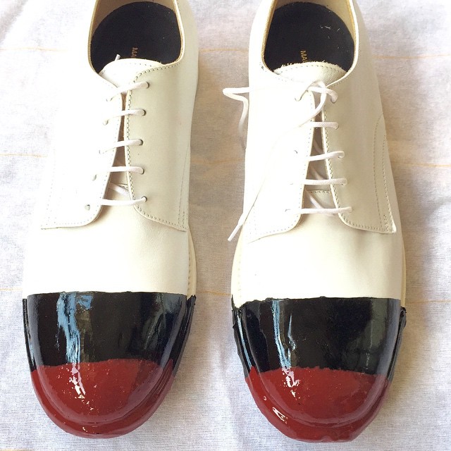 Handmade shoes dipped in rubber. Made to order